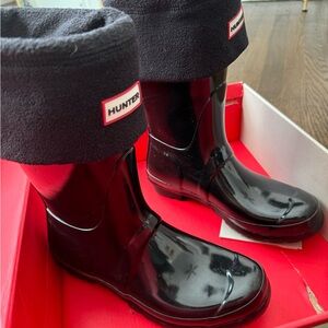 Black glossy Hunter rain boots. Size US Women’s 9